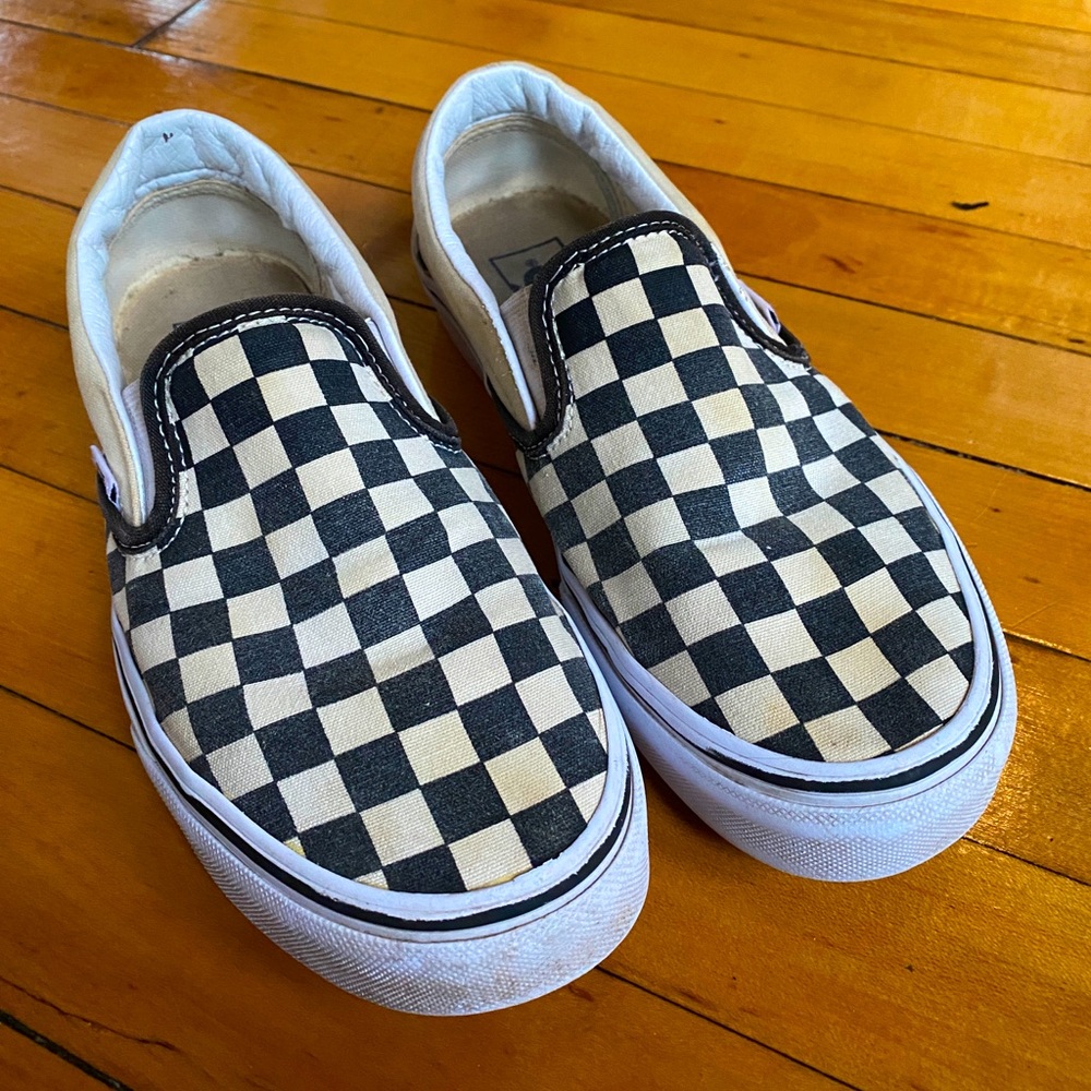 Vans checkered slip ons black and white